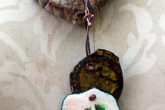 resin coated bottle cap Cholla disc necklace with enameled #8 and a bottlecap accent