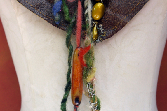 concrete charm, vintage accents and yarn fringe Gathered brown leather fringe bib necklace with blue capiz shell