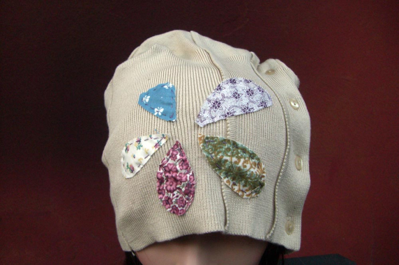 Tan sweater hat Fabric remnants form the flower