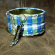 Recycled blue plaid tin can soldered cuff with high heel charm