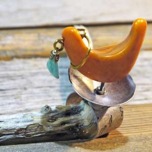 Adjustable base metal ring with orange tagua nut